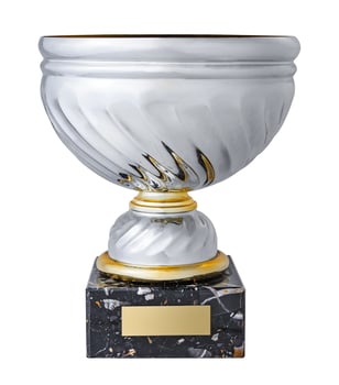 A silver trophy cup with marble stand and gilded plaque, isolated on a white background photo