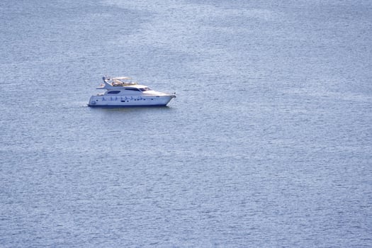 View on the private motor yacht on the water with copy space photo