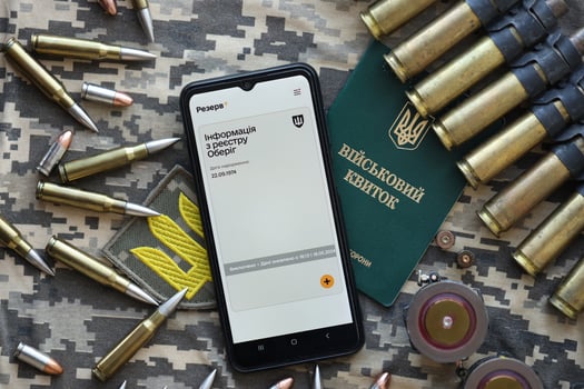 KYIV, UKRAINE - JUNE 20, 2024 Rezerv plus - ukrainian application for smartphone with actual personal information about conscript status for military recruits photo