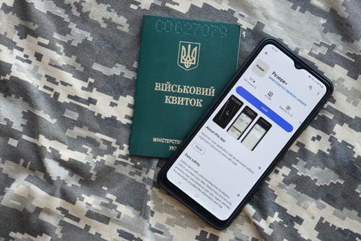 KYIV, UKRAINE - JUNE 20, 2024 Rezerv plus - ukrainian application for smartphone with actual personal information about conscript status for military recruits photo
