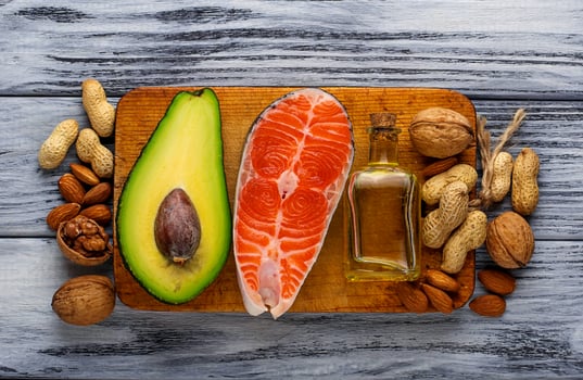 Healthy fat salmon, avocado, oil, nuts photo