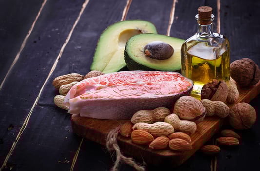 Healthy fat salmon, avocado, oil, nuts photo