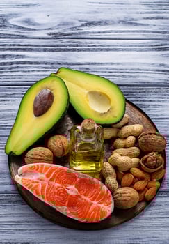 Healthy fat salmon, avocado, oil, nuts photo