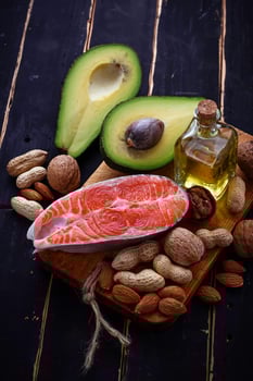 Healthy fat salmon, avocado, oil, nuts photo