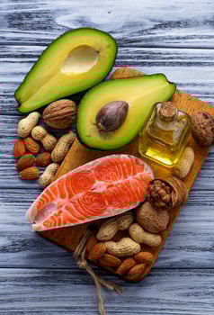 Healthy fat salmon, avocado, oil, nuts photo
