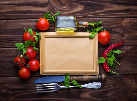 Fresh cherry tomato, parsley and frame for text photo
