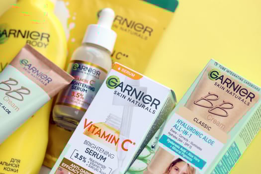 KYIV, UKRAINE - APRIL 20, 2024 Garnier production with company logo. Garnier is a mass market cosmetics brand of French cosmetics company L'Oreal photo