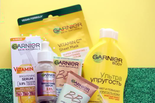 KYIV, UKRAINE - APRIL 20, 2024 Garnier production with company logo. Garnier is a mass market cosmetics brand of French cosmetics company L'Oreal photo