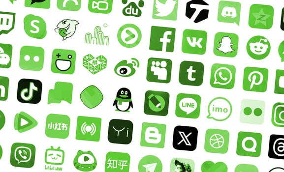 KYIV, UKRAINE - APRIL 1, 2024 Many icons of social media, messengers, sharing platforms photo