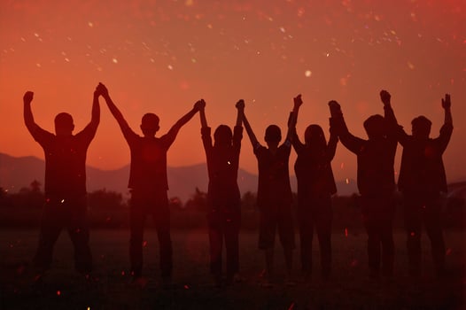 Silhouette of happiness and being free and relaxed in living life, success and working towards planned life goals. photo