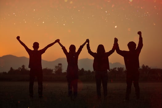 Silhouette of happiness and being free and relaxed in living life, success and working towards planned life goals. photo