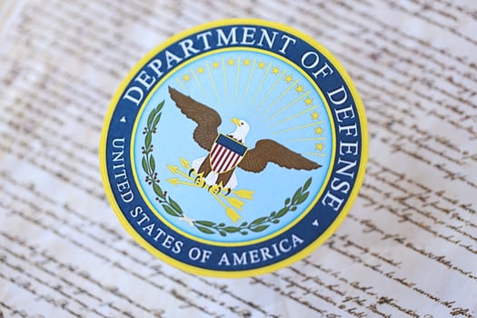KYIV, UKRAINE - MARCH 9, 2024 US Department of Defense seal on United States Constitution photo