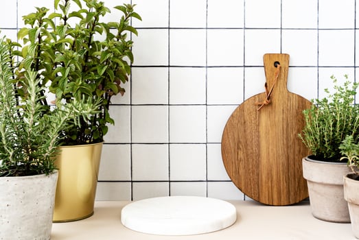 Stylish white kitchen background with marble white round podium for advertising eco or healthy products, food, objects for kitchen photo