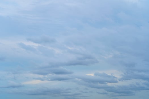 The sky is full of clouds floating around photo