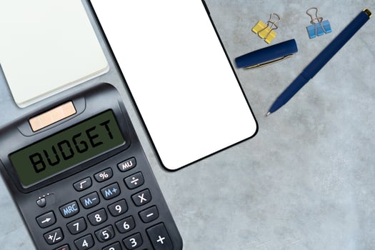 Top view of Calculator with word Budget photo