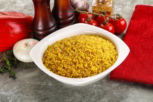 Dry wheat bulgur cereal heap photo