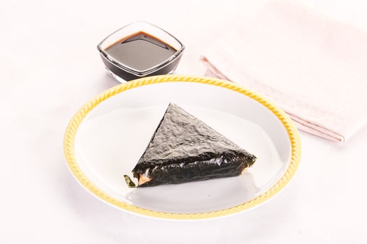 Japanese traditional onigiri with fish photo