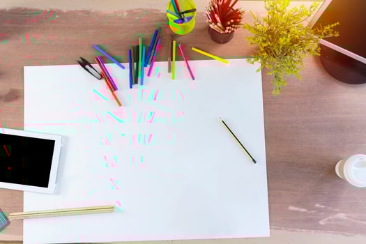 Creative design top view concept. Blank paper with stationery photo