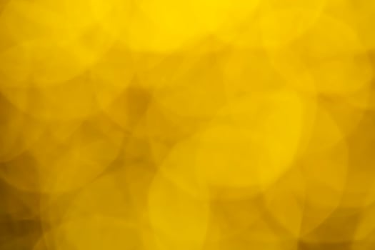 Gold abstract bokeh background. Abstract Golden glare on abstract bokeh background. photo