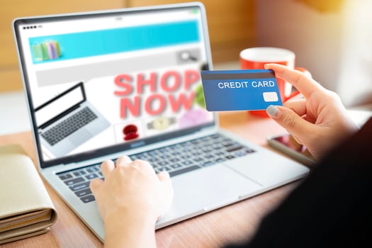 Online Shopping Website on Laptop. Easy E-commerce Website Shop by Smartphone, iPhone, iPad and Laptop. Close up Hands Using Smartphone Shopping Cart read Online Article, Blog. Digital Payment gateway photo