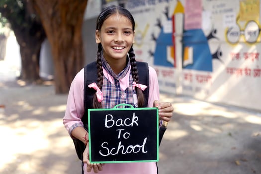 Asian School Student Holding Black Slate photo