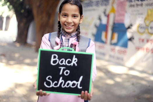 Sweet Girl Holding A Slate photo