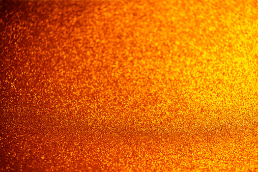 Orange glitter bokeh circle glow blurred and blur abstract. Glittering shimmer bright luxury . White and silver glisten twinkle for texture wallpaper and background backdrop. photo