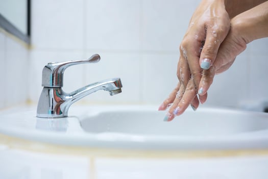 skin care, disinfection. Soaping your hands with antibacterial soap photo