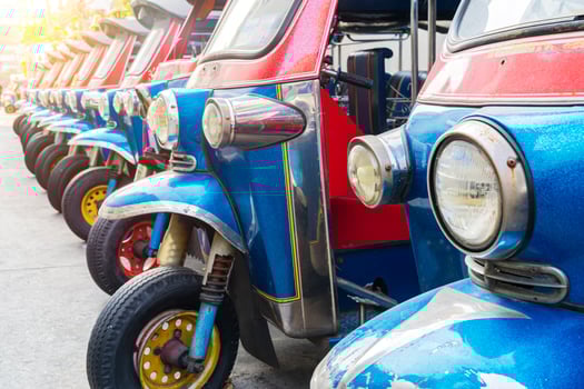 tuk-tuk parking, traditional taxi at Bangkok in Thailand photo