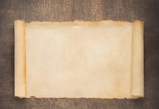 Vintage Parchment Paper on Wooden Surface photo