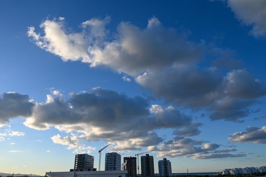 blue sky and clouds over the construction site of a residential complex 3 photo