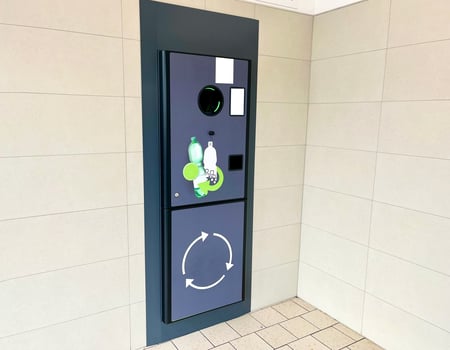 Vending machine for plastic bottles. Reversible Vending Machine for Plastic Waste Recycling photo