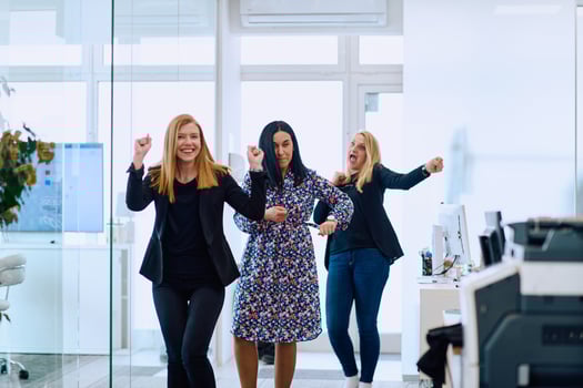 Dynamic Businesswomen. Spreading Joy and Energy Through Office Dance photo