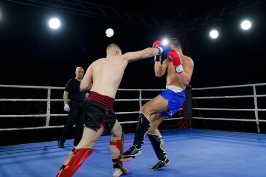 Fierce boxing match showcases athletes' power and skill. photo