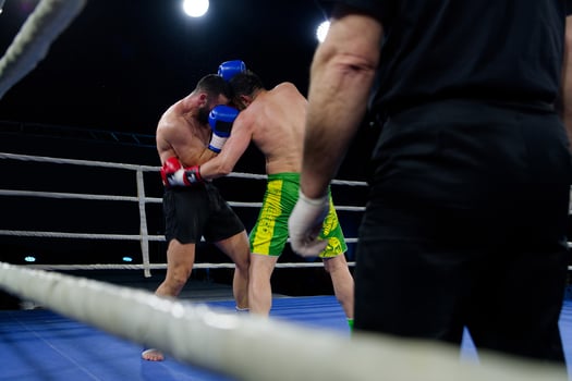 Fierce boxing match showcases athletes' power and skill. photo