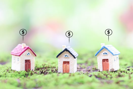 Miniature house and Dollar coin icons. The concept of price of house, Property investment, House mortgage, Real estate photo