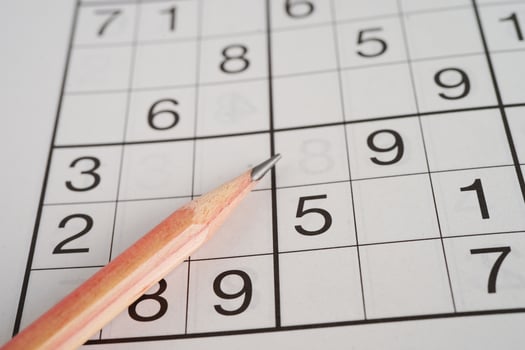 Sudoku puzzle, game to play for keep you brain younger for developing Alzheimer disease in senior patient. photo