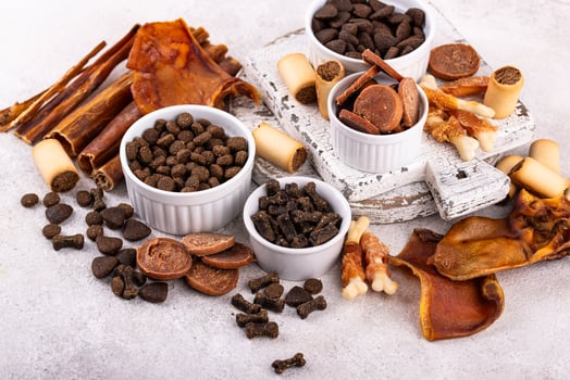 Assortment of different dog treats and snack photo
