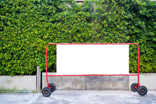 Mock up. Shoping trolley bay in a parking lot near supermarket photo
