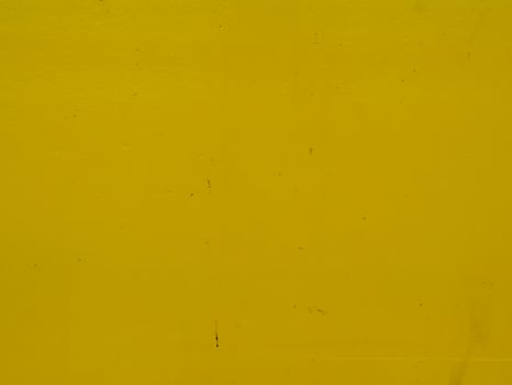 Yellow painted steel texture for a close-up background of a building or construction. photo