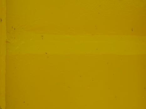 Yellow painted steel texture for a close-up background of a building or construction. photo