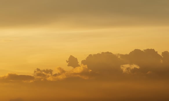 Yellow cloud scape background at sunrise time photo
