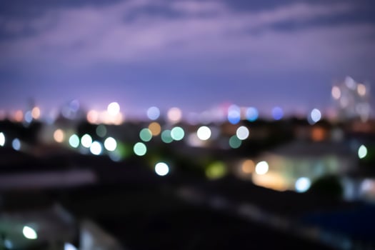 City blurred lights background after sunset photo