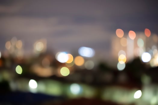 Bokeh abstract background of skyscraper buildings in Bangkok city photo