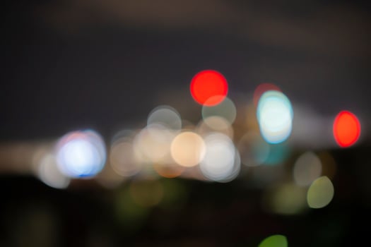 Night city street lights bokeh background photo