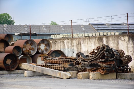 Industrial scrap metal that rusts is automotive industry parts and metal parts of large machines. Pile of various rusted industrial steel equipment on the floor in an factory 2025. photo