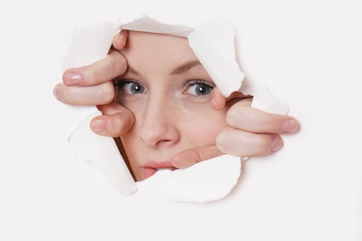 young woman peeking photo