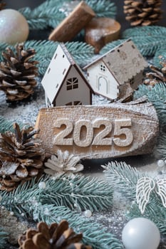 Snow numbers 2025 New Year on wooden backgrounds with winter decorations photo