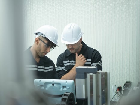 Teamwork male man talk speak discussion explain group labor employment group meeting robot repair facility professional engineer manufacturing equipment leadership professional support project site photo