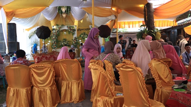 Guests enjoying a traditional wedding party photo